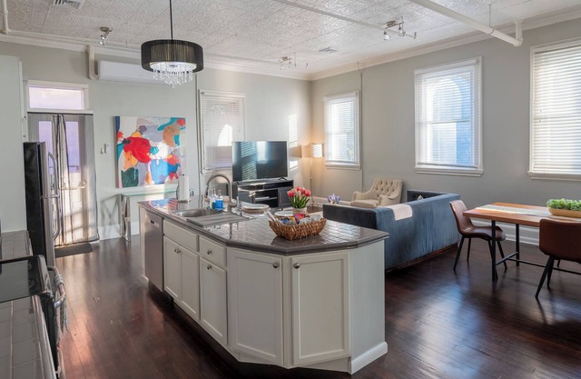 Bright lofty, soaring tin ceilings