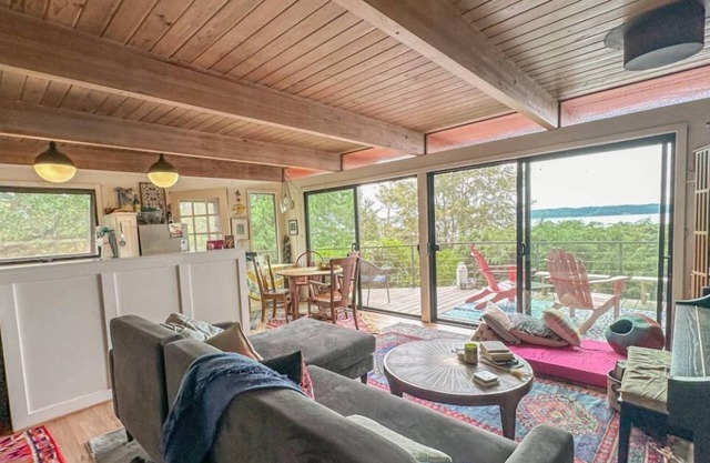 Charming and eclectic treehouse-like home with expansive Puget Sound views