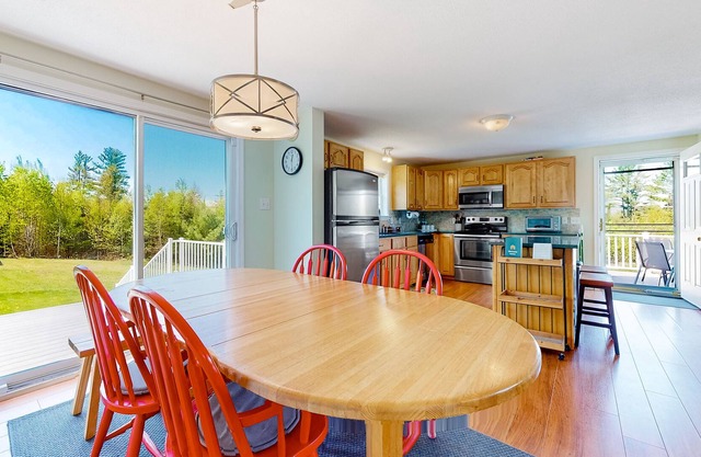 Charming Landaff home with a deck, firepit, fireplace, partial AC, and W/D