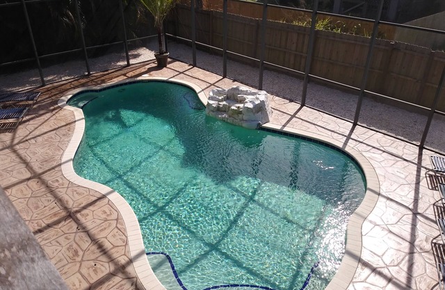 Coastal Paradise w/ heated pool, clean and comfy, centrally located