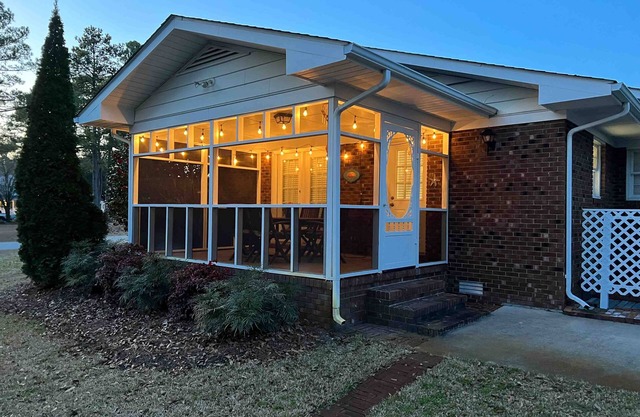 Comfortable home near beach with enclosed porch, washer/dryer, & central AC