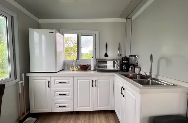 Cómoda y acogedora mini casa ubicada en un hermoso lote. ¡Buena ubicación!