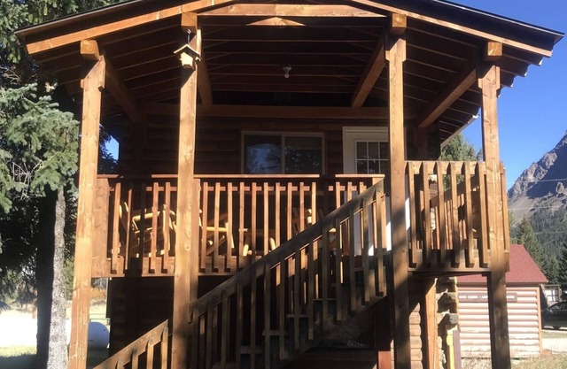 Comfy cabin is situated on the Silver Gate property which overlooks 10,000ft tall mountain peaks surrounding the town.