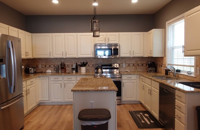 Cozy family size house , with deck and grill . Friendly ,quiet neighborhood !