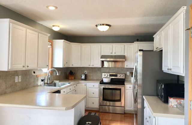 Acogedora casa con 4 habitaciones en Urbandale