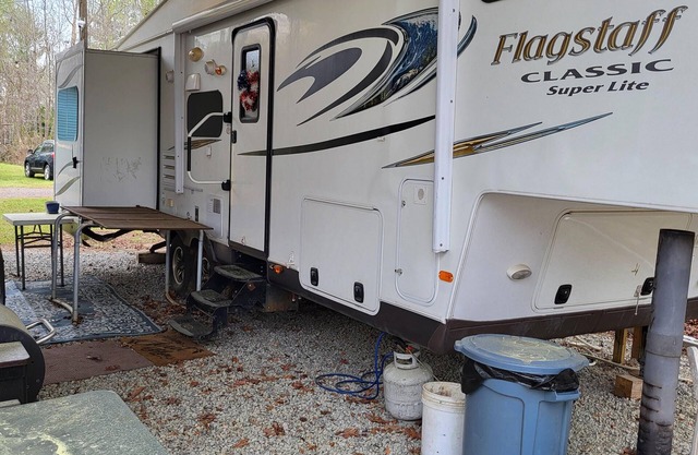 Cozy RV at Blue Springs Landing with all the comforts of home.
