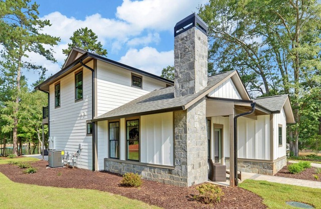 Cozy up to a warm fire and enjoy this fall retreat on beautiful Lake Hartwell.