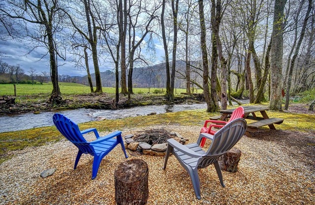 Creekfront Hayesville retreat w/ wrap-around porch and views!
