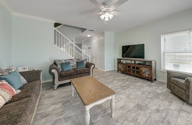 Dog-friendly coastal home with shared pool, easy beach access & perfect location