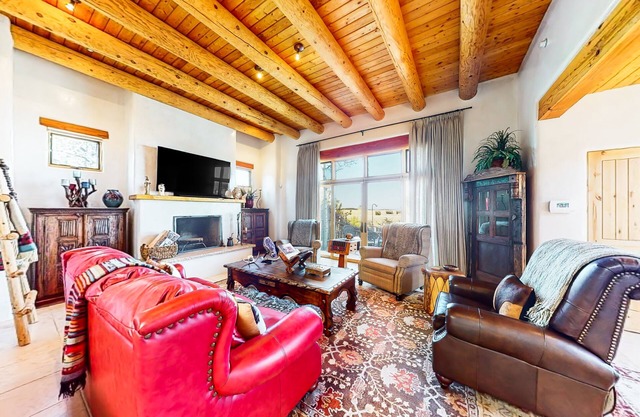 Dog-friendly condo with kiva fireplaces, enclosed yard, & pool access