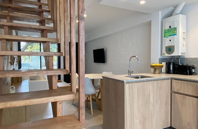 Duplex en el Cerro de Las Rosas by Lugar