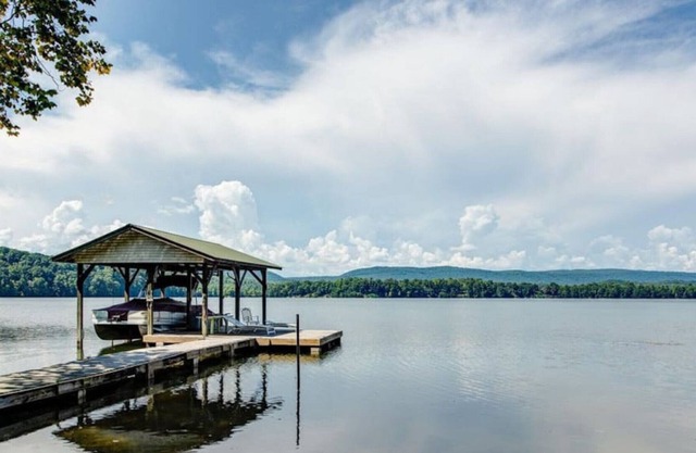 Eagle Point with a flat yard that has it all! Perfect multi-generational vacation home!