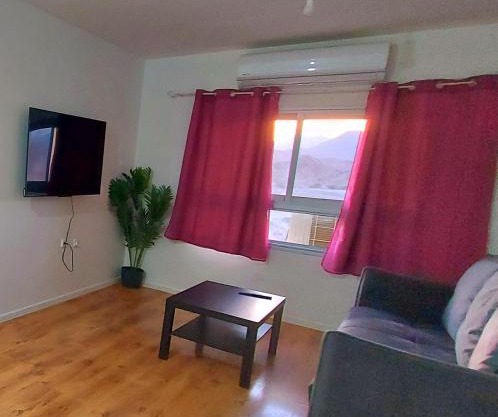 Eilat Octopus Apartment - אילת אוקטופוס -שני חדרים וסלון, בריכה בקיץ