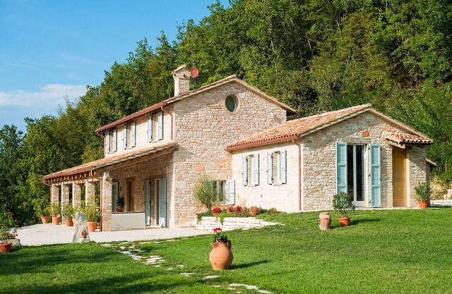 Elegante villa con jardín
