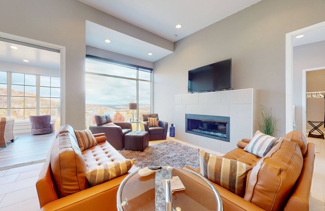 Elevated lake-view escape w/ free attraction tickets, movie room, & sun room