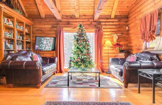 Chalet de registro en el bosque