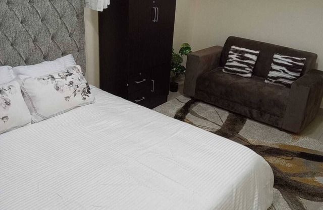 Escape to comfort 2-bedroom apartment with WiFi, AC in fabulous Abu Dhabi