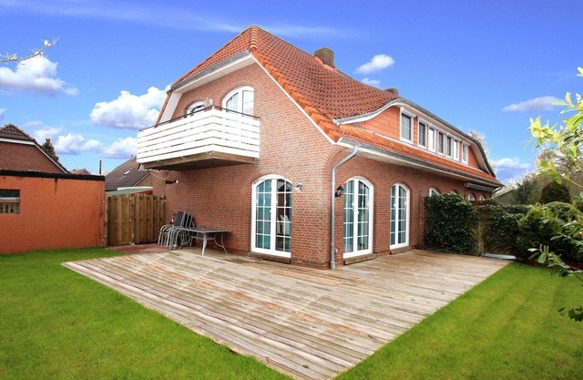 Ferienhaus en Dornum mit Garten