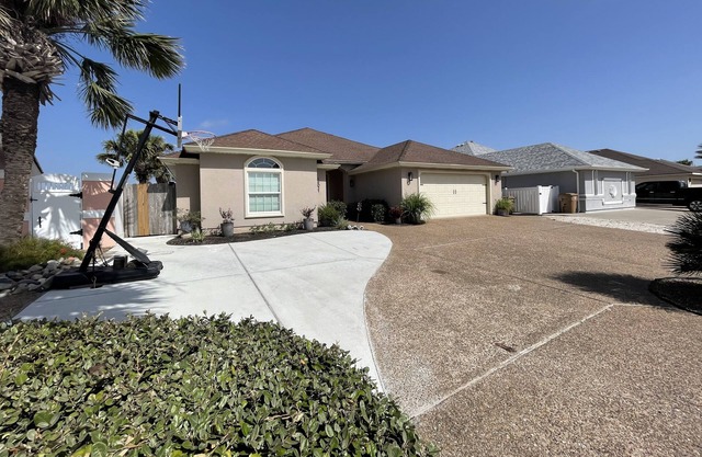 Fully-furnished waterfront home with amazing sunset views and custom finishings
