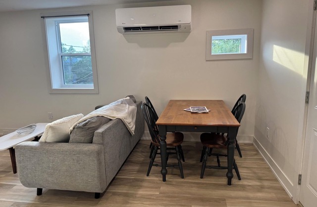 Golden Acre Suites | 2BR Downtown w/ Exposed Brick & Retro Retreat