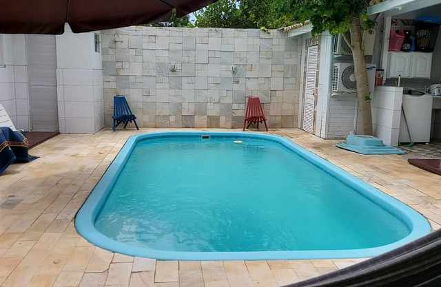 APARTAMENTO TÉRREO CON PISCINA EN AMBIENTE FAMILIAR
