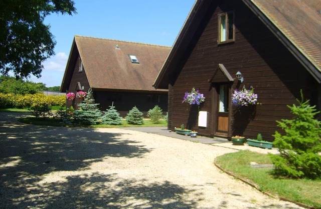 Hardy Chalet Chalet de estilo escandinavo en granja lechera en funcionamiento