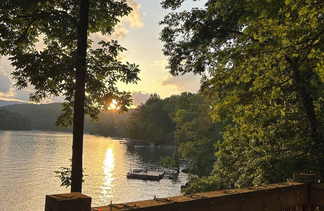 Hickory Harbor lakefront w/ dock, grilling deck, and play yard on shady lot!