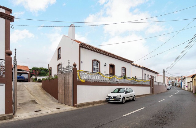 Casa de vacaciones 'Casa Das Rosas' con vistas al mar, terraza privada y Wi-Fi