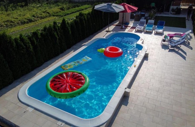 House with swimming heated pool next to the river