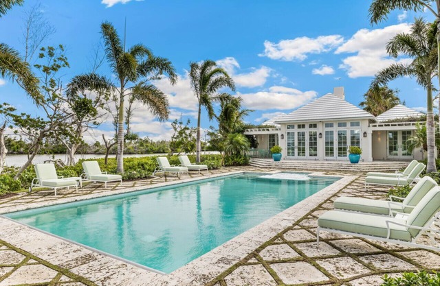 Immerse Yourself in Luxury! Stunning 6 Bedroom Home w/ Pool & Dock