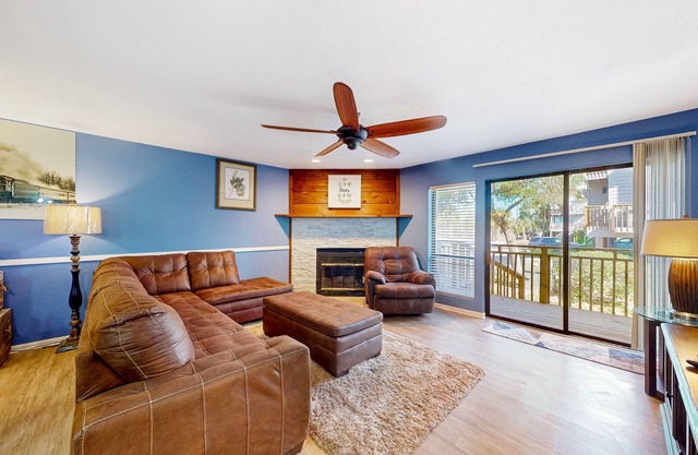 Inviting townhouse with on-site pool, updated interior, & W/D