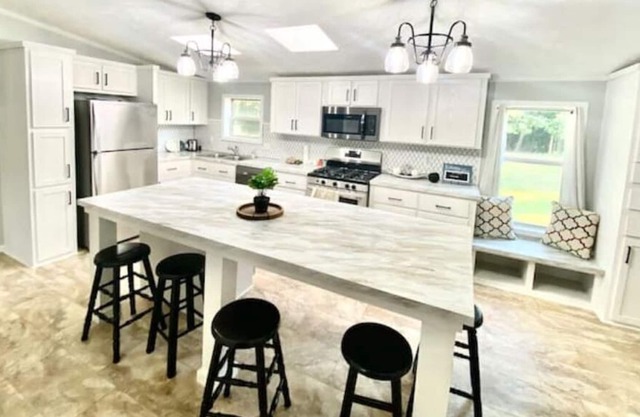 SYLVAN HIDEAWAY -Lake Access, Large Yard, Near Event Center, Shuffleboard & More