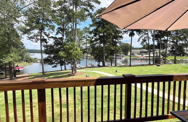 Family-sized waterfront townhome on beautiful cove! Pool, boat access & fishing!