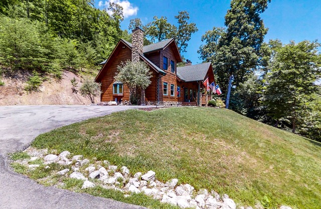 Lake view dog-friendly cabin w/private deck, gas grill, wood fireplace, and W/D