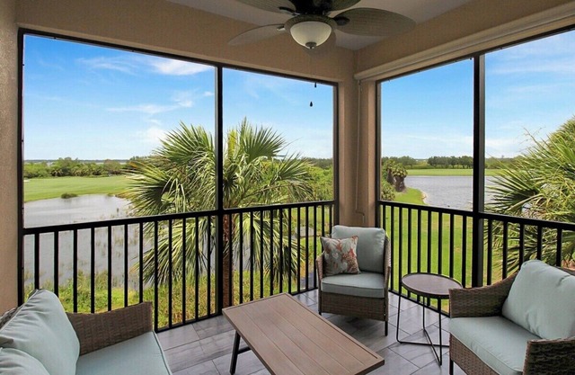 Lakefront 3rd floor condo at River Strand Golf and Country Club - Fairway to Paradise