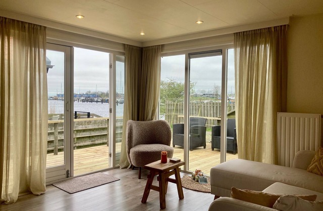 Casa de vacaciones 'Lauwers Loft' (4 pers.) con terraza en el lago Lauwersmeer