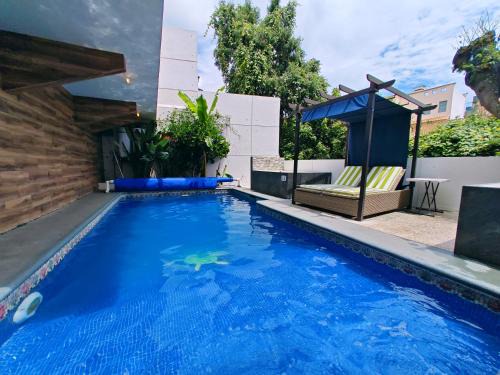 Loft Estilo & Diseño, disfruta de alberca climatizada, 2 jacuzzis para tu uso personal y exclusivo con agua caliente y sistema de hidromasaje tipo Spa, terraza privada y asador de carbon