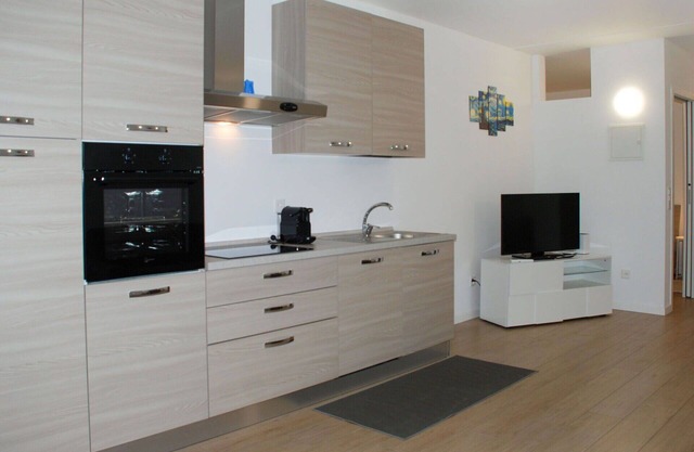 Hermoso apartamento para 4 personas con A/C, WIFI, piscina, TV, vista panorámica y aparcamiento