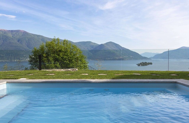 Bonito apartamento en villa con A/C, internet, piscina, TV, patio, vista panorámica, aparcamiento