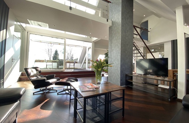 Luxury loft over 2 floors with sauna, loggia and terrace