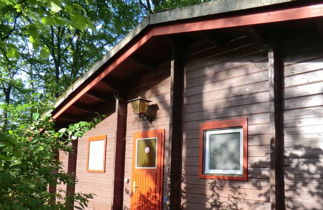 Tirado en un día de fiesta península casa en estilo Swiss Cottage