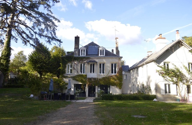 Maison l'Amérique le da la bienvenida a una de sus habitaciones. Los perros también son bienvenidos.