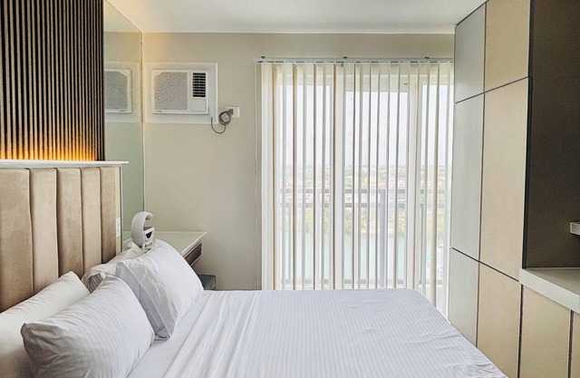Habitación moderna en condominio con vista a la ciudad