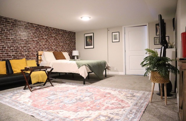 Modern Industrial 1BR W/ Gym, Ping-Pong, and More!