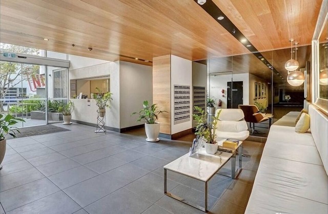 Modern top floor, entire unit with parking, pool & gym