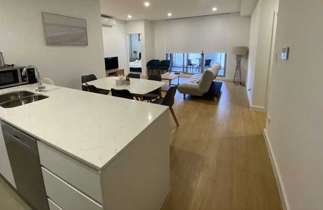 Modern two bedroom apartment/shops/trains