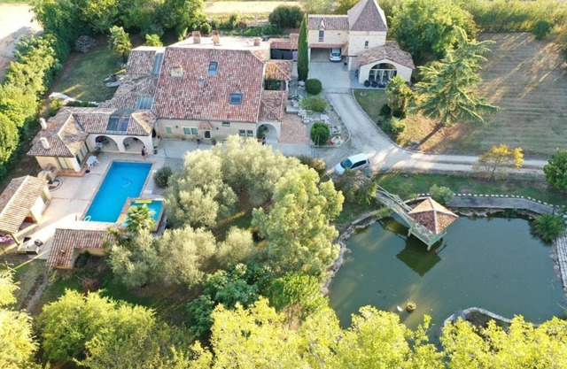 Bucolic stone estate and its cascading basin.