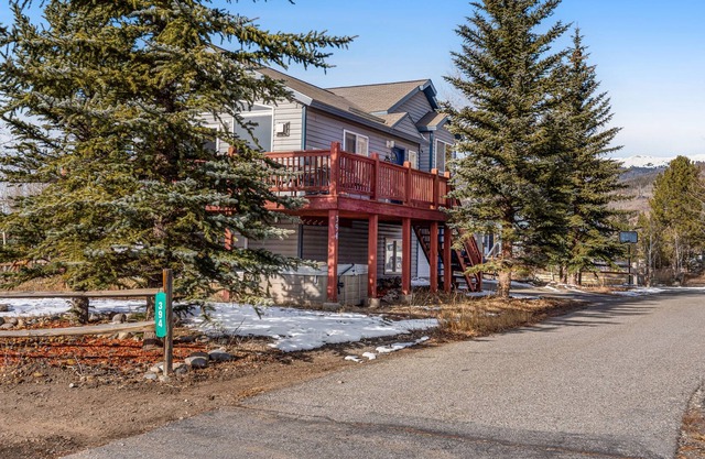 Mountain view home with private hot tub, fireplace, charming interior & deck