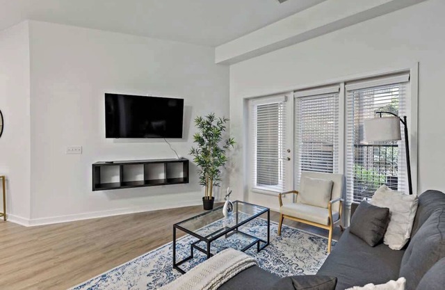 Modern 2BR Retreat | 5 Mins to Downtown | Gym + Parking + W/D