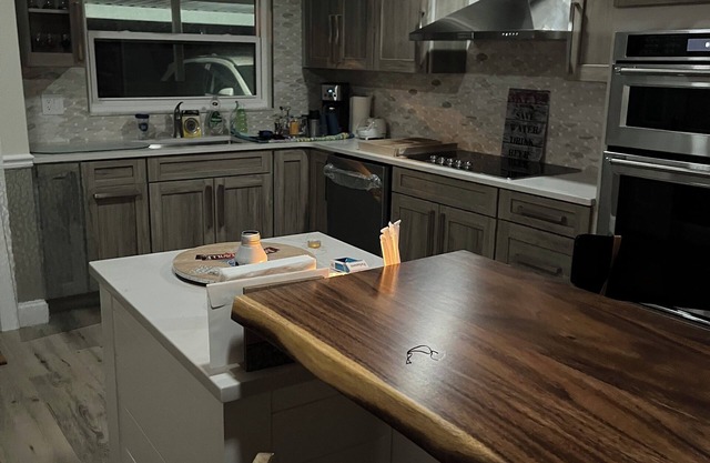 Newly completely renovated 2-bedroom, 2 full bath condo with bar.
